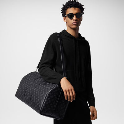 | Louis Vuitton - Keepall 55 avec bandoulière